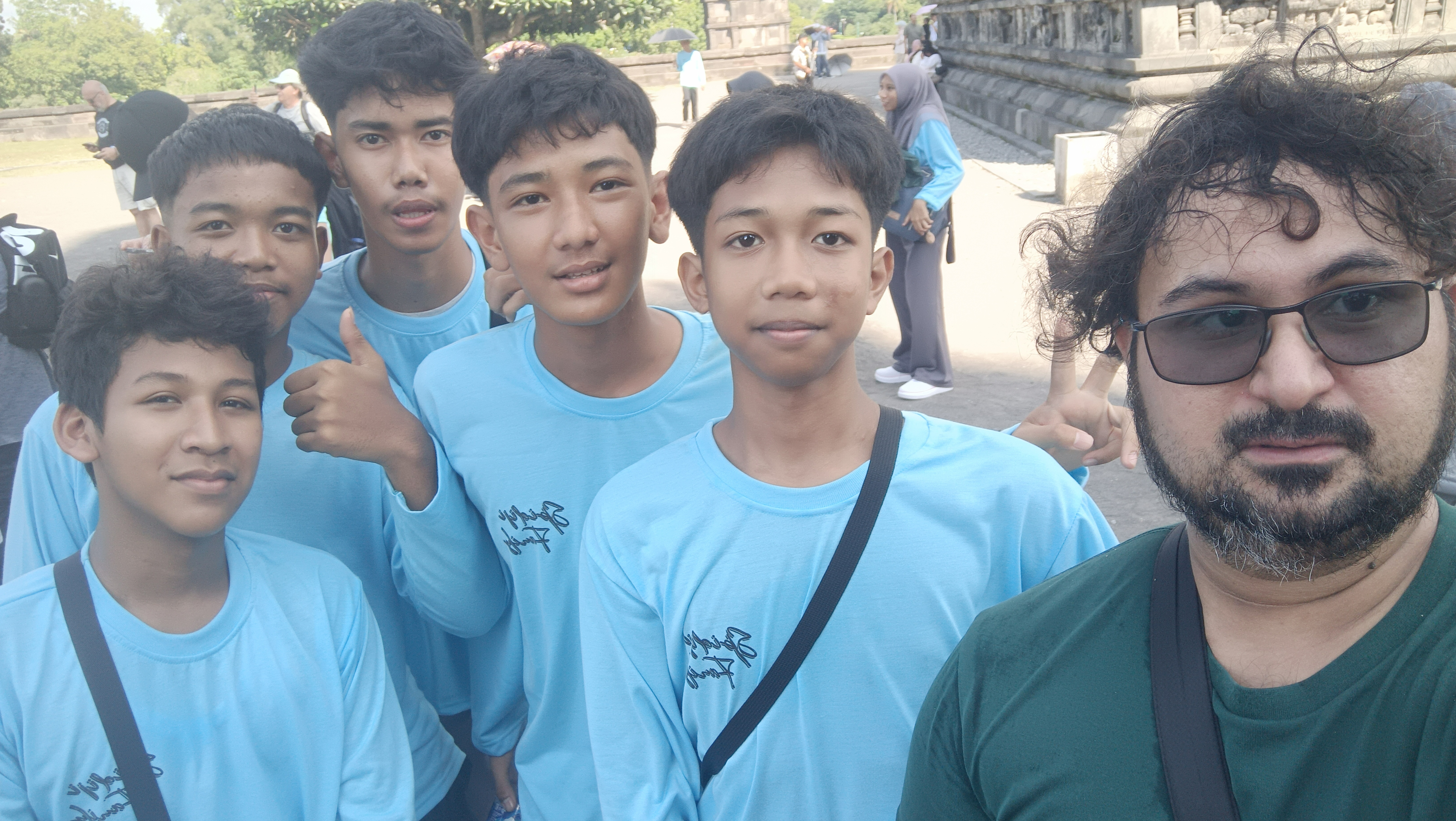 Prambanan Temple: The 00:00 Guide to Java’s Hindu Twin Solo traveler with Indonesian school students in blue uniforms at Prambanan Temple Yogyakarta
