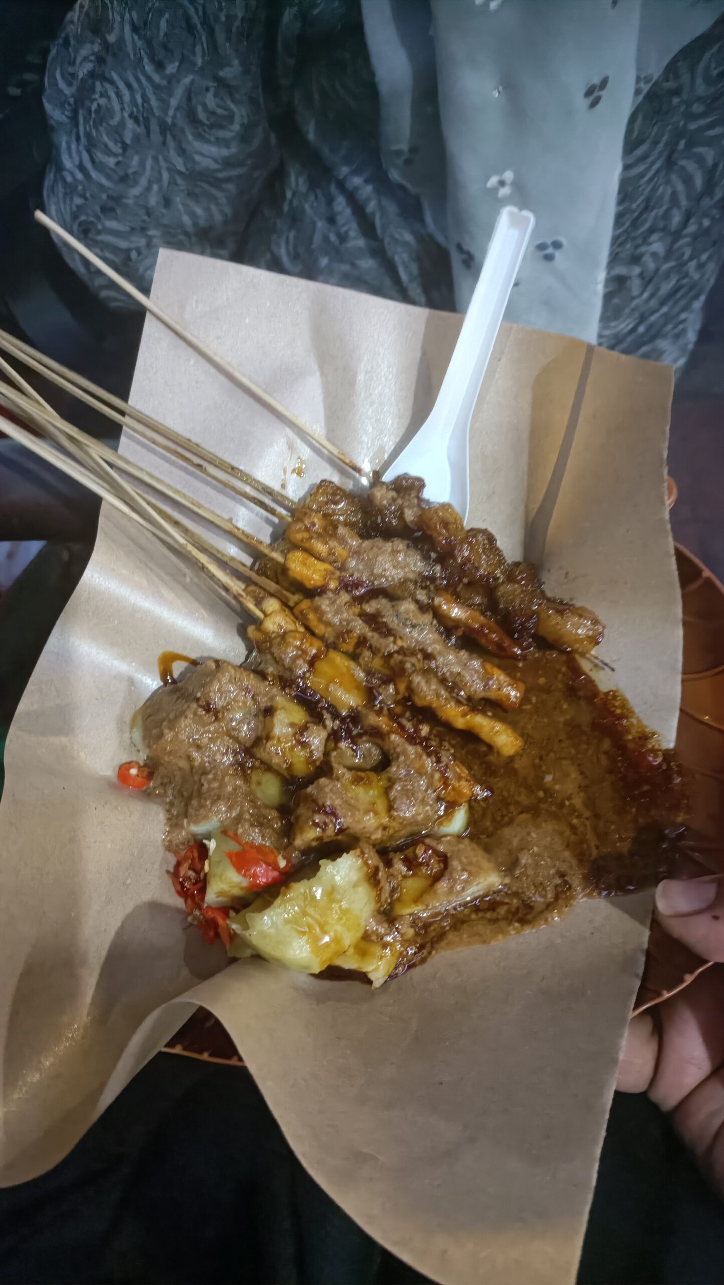 Sate kambing goat satay with peanut sauce on Maliboro Street Jogja at night 