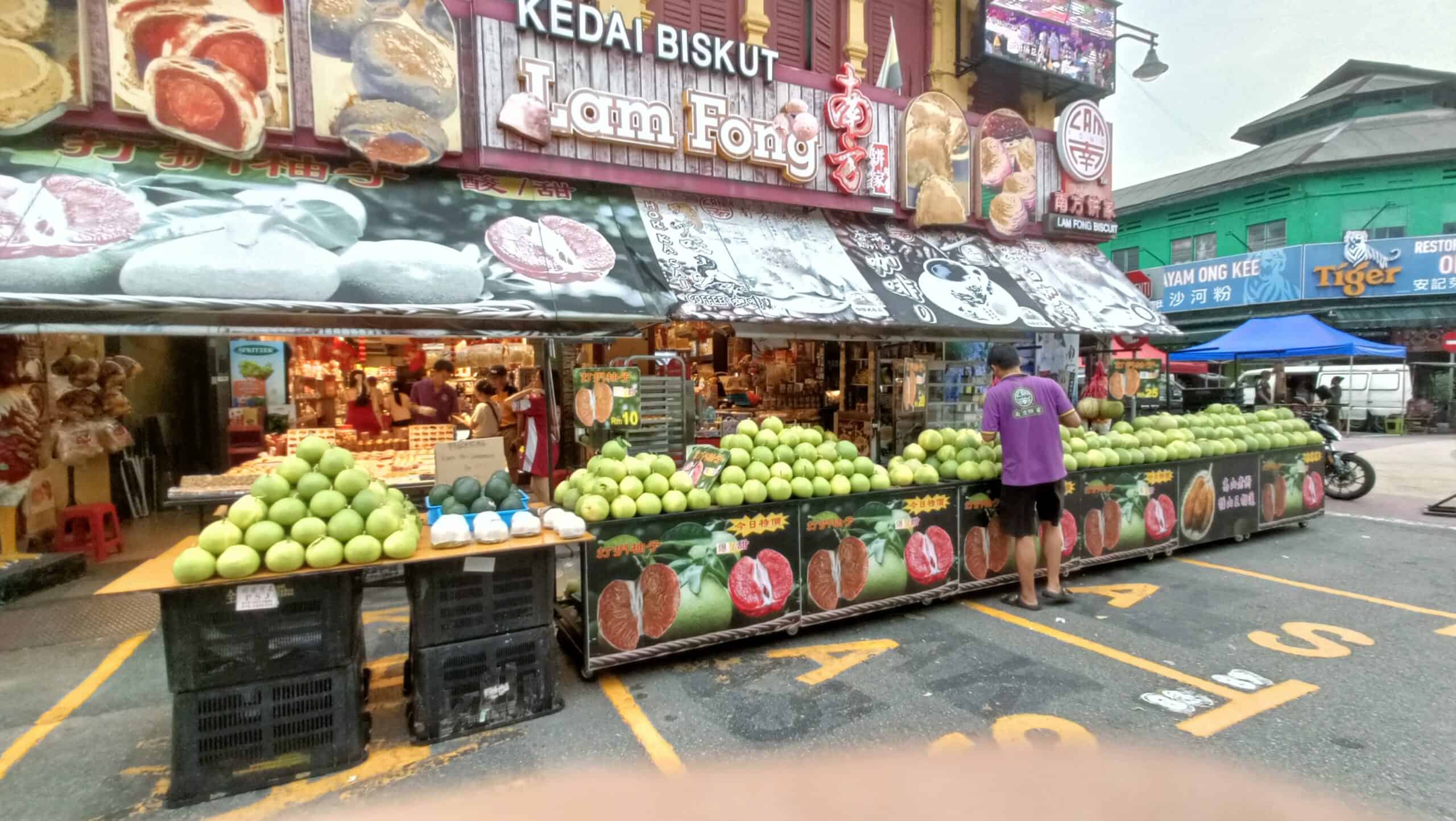 Pomelo fruits store, next to Onn Kee 